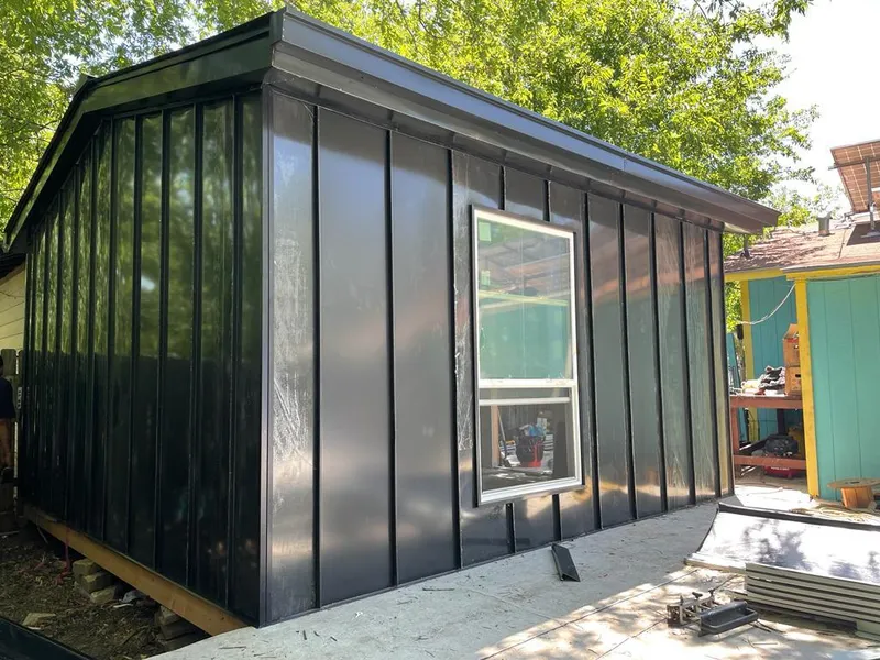 Black standing seam metal wall panels for Roof Inspection in Nassau Bay