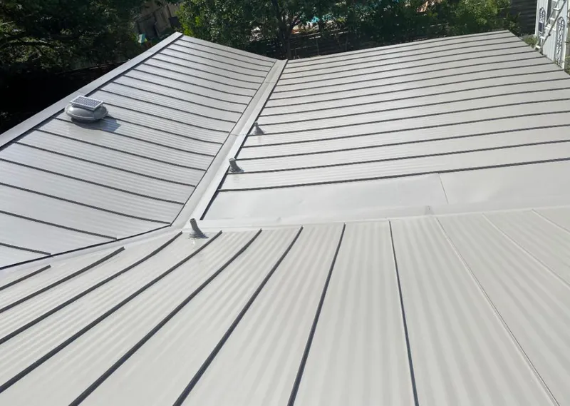 Solar attic fan installed on a metal roof for Roof Ventilation in Nassau Bay