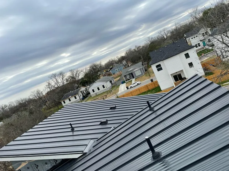 Standing seam metal roof panels with vents for Skylight Repair in Nassau Bay